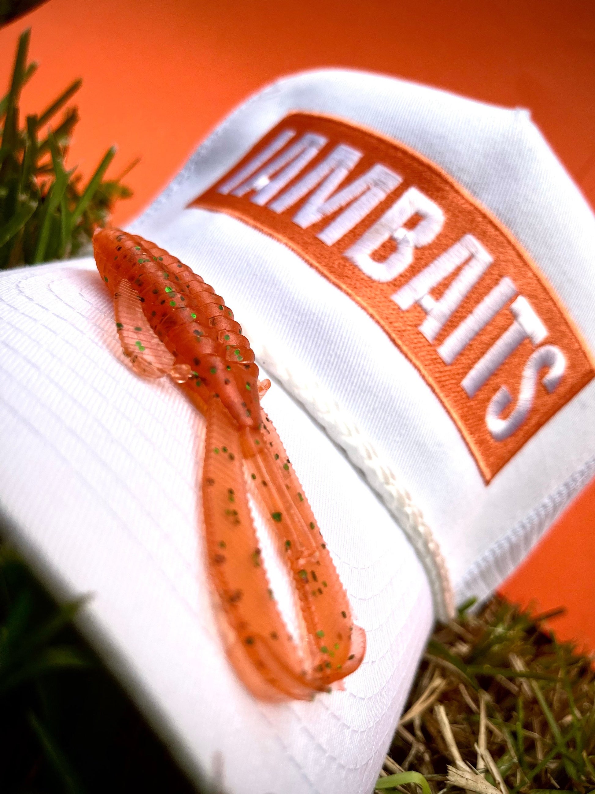 IAMBAITS:Orange trucker hat